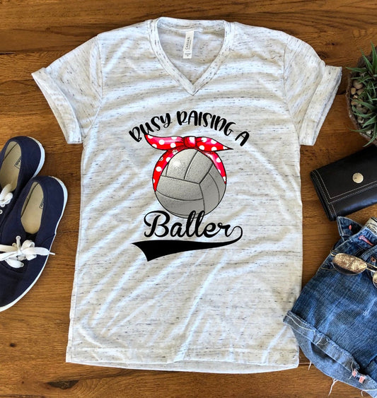 Busy Raising a Baller Volleyball Mom Unisex V Neck Graphic Tee T-Shirt