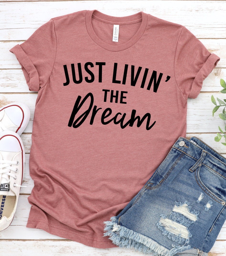 Just Living The Dream, Inspirational Message, Motivational, She is Strong, Positive Message, Unisex Novelty T-Shirt